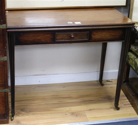 A George III mahogany folding top tea table W.89cm